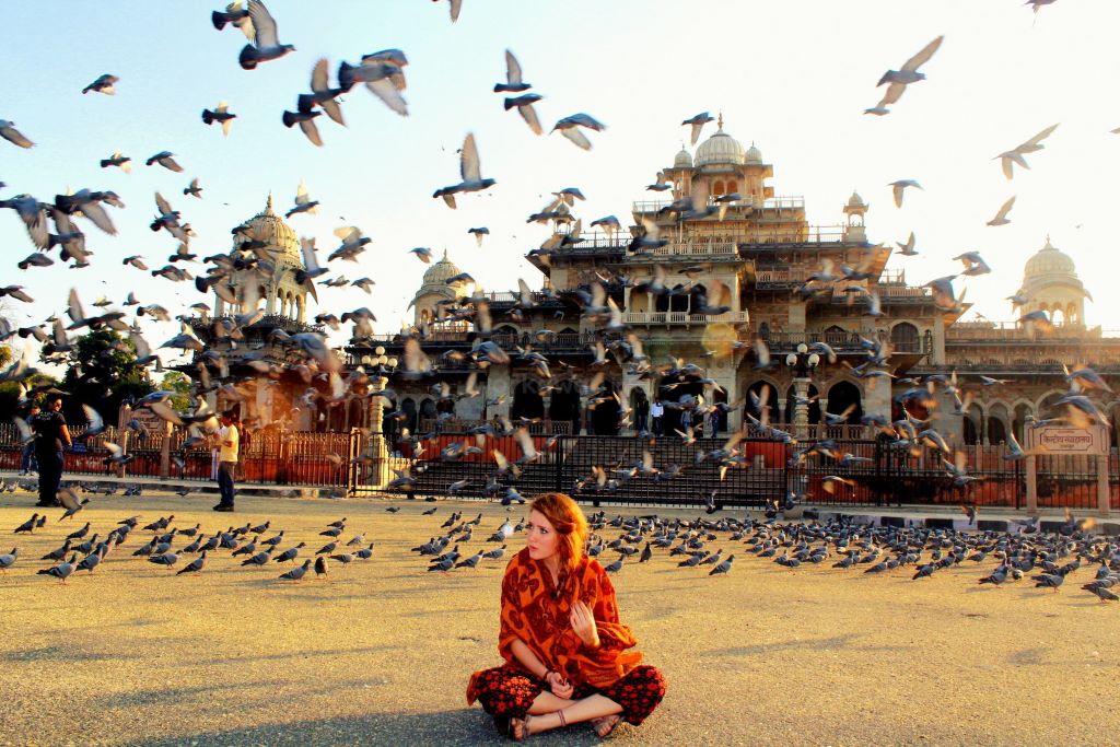 Traveler exploring a hidden village away from crowded tourist spots